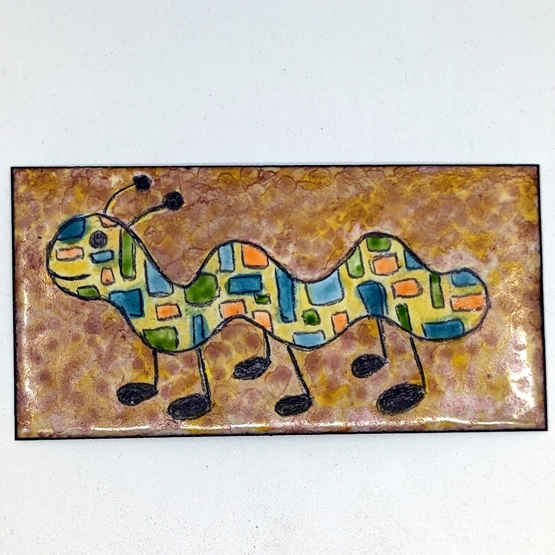 Caterpillar Tile - Enamel tile with mosaic caterpillar design